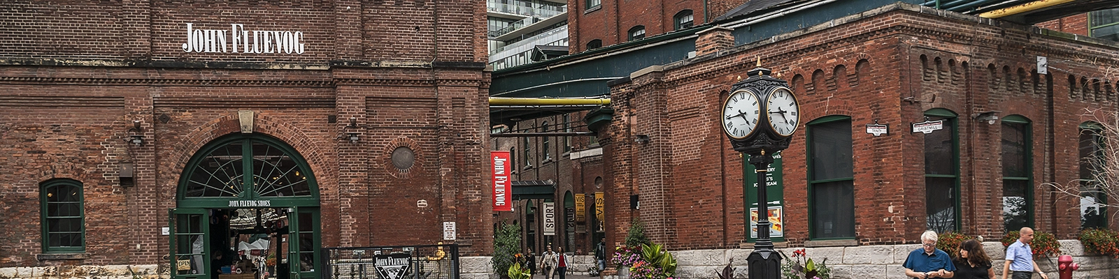 Historic Distillery District in Toronto, featuring cobblestone streets, Victorian-era buildings, and charming atmosphere
