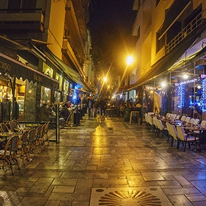 Nightime in Kolonaki. Street scene of outdoor cafes.