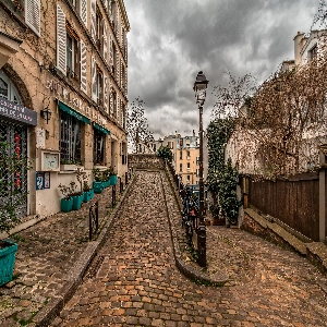 A picturesque view of the historic Le Marais district, with its charming narrow streets, trendy shops, and beautiful architecture in Paris, France.