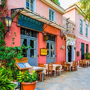 Plaka in Athens, Greece - a historic neighborhood known for its picturesque streets, traditional architecture, and charming cafes, offering a glimpse into the rich culture and history of Athens.