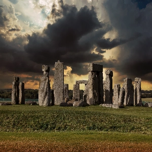 View of Stonehenge with dramatic skies in the background.