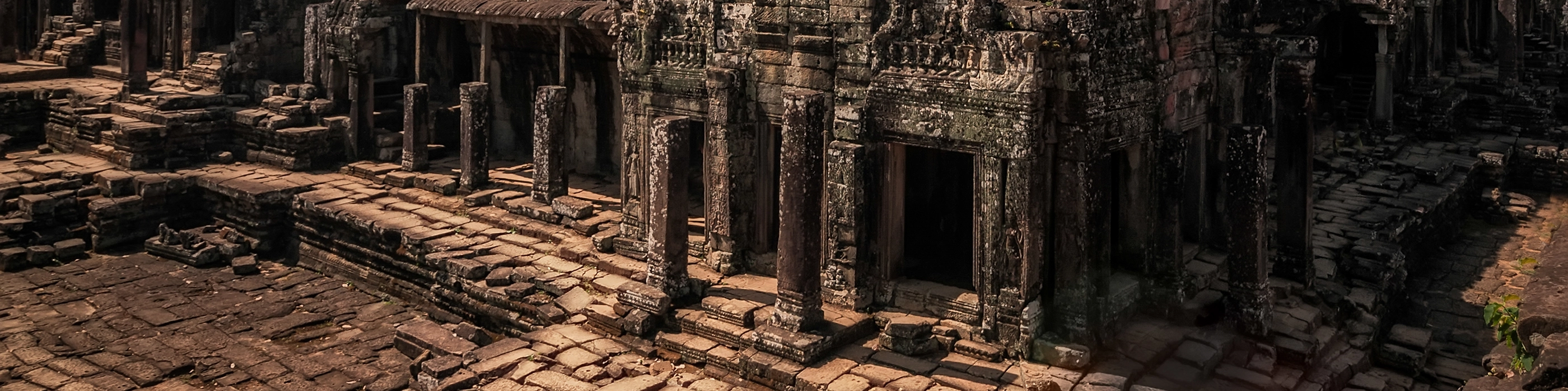 Ancient Angkor Wat temple complex surrounded by lush greenery in Cambodia