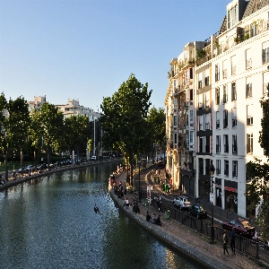 Scenic view of Canal Saint-Martin, a popular Parisian waterfront destination