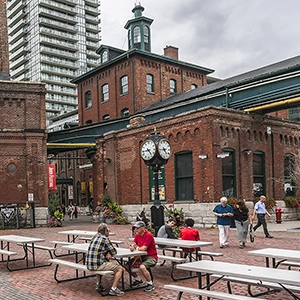 Historic Distillery District in Toronto, featuring cobblestone streets, Victorian-era buildings, and charming atmosphere