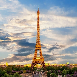 Majestic Eiffel Tower in Paris, France during the daytime with a blue sky backdrop