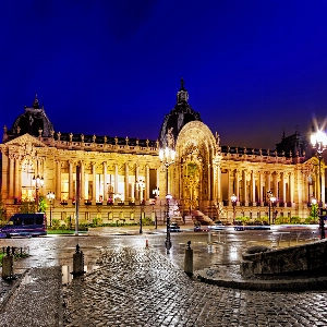 "Stunning view of the iconic Grand Palais with its beautiful glass dome and intricate architecture in Paris"