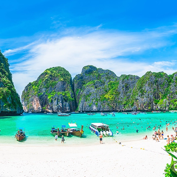 Panoramic view of pristine beaches in Asia with crystal clear waters and lush palm trees