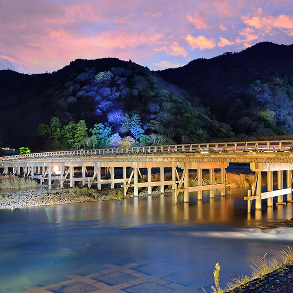 Togetsukyo Bridge in Kyoto, Japan - a historic and iconic bridge spanning across the Katsura River, surrounded by beautiful scenery